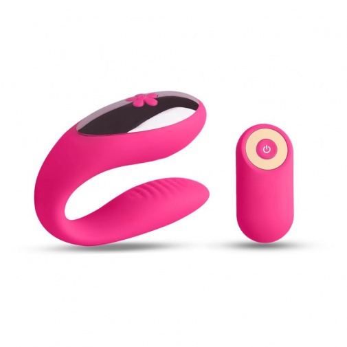 Růžový silikonový vibrátor pro páry ve tvaru písmena U s bezdrátovým ovladačem - Love Nest.