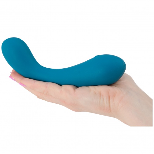 Silikonový modrý vibrátor The Swan Curve Squeeze control v ruce.