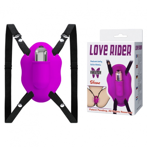 Balení fialového silikonového strap-on stimulátoru klitorisu Love Rider.