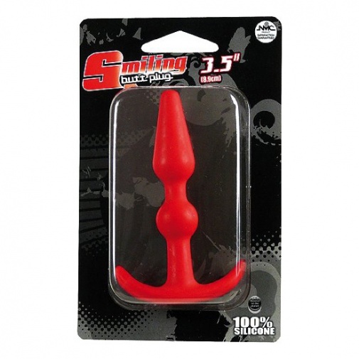 Silikonový anální kolík v červené barvě - Smiling Butt Plug 9 cm.